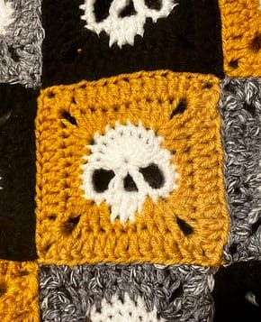 Granny Square Skull Sweater – FREE Pattern - Sara Rosado Crochet Random Granny Square Blanket, Gothic Crochet Granny Square, Halloween Granny Square Crochet Patterns Free, Skull Motif Crochet Pattern, Skull Granny Square Sweater, Skull Crochet Granny Square Pattern, Pixel Crochet Halloween, Free Skull Granny Square Pattern, Skull Granny Square Blanket