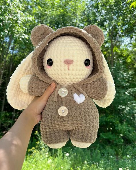 bunny in a bear onesie 🧸 his onesie is removable! available on my etsy ☁️ tags 🏷️ #crochet #crochetaddict #crochetbunny #crochetplush #crochetplushie #crochetplushies #smallbusiness #smallbusinessowner #smallbusinesssupport #crochetersofinstagram #crochetinspiration #crochetpattern #crochettoy #plush #plushies Crochet Clothes For Stuffed Animals, Crochet Bunny Plush, Bunny From A Square, Crocheted Plushies, Crochet Stuffed Toys, Plushies Crochet, Crochet Bunnies, Crochet Bears, Bear Onesie