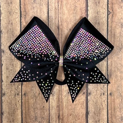 "This gorgeous bow is covered with over over 700 AB crystals, available in any color combo or stone color. Badda Bling Bows provides the highest quality bows on the market specializing in individual, practice and team bows and we uniform match. - FREE SHIPPING on all team orders. - Made with 3\" ribbon and premium nylon elastic hair bands that won't damage hair as they have no metal parts and are seamless. - Packaged and shipped in a box to ensure it arrives in perfect condition. Follow us on: F Competition Cheer Bows, Cheer Captain Bows, Competition Bows, Cheer Bows Rhinestones, Sparkly Cheer Bows, Silver Cheer Bows, Bling Bows, Elastic Hair Bands, All Team