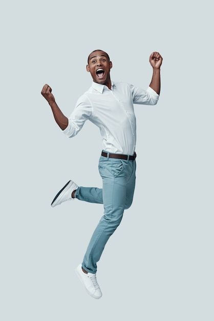 Happy Black Man, Jumping People, Success People, Christian Background Images, Man Jumping, Stock Photos People, Human Pictures, African Dance, Happy Man