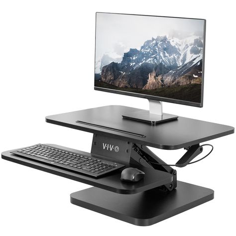 PRICES MAY VARY. Sit to Stand - Adjustable workstation allows you to find the healthy balance between sitting and standing at the office. With a durable gas spring, you can adjust your desk riser in one smooth motion via pressure handle. (Adjustable range: 5 to 16 inches) Space Efficiency - Provided by an upper desktop measuring 25" x 18" and a lower tier measuring 25" x 10", which allows the riser to fit in most workstations and still provide room for different monitor/laptop setups. Sturdy Lif Laptop Setup, Height Adjustable Workstation, Best Standing Desk, Desk Converter, Space Efficiency, Desk Riser, Standing Desk Converter, Monitor Riser, Computer Workstation