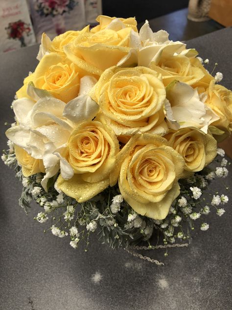 Yellow roses and gardenia bridal bouquet Fall Yellow Bouquet, Yellow Rose Decorations, Yellow Glitter Roses, Bouquet Of Yellow Roses, Yellow And White Roses Bouquet, Yellow Quince Decorations, Pale Yellow Bouquet, Yellow Roses Wedding Bouquet, Light Yellow Bouquet