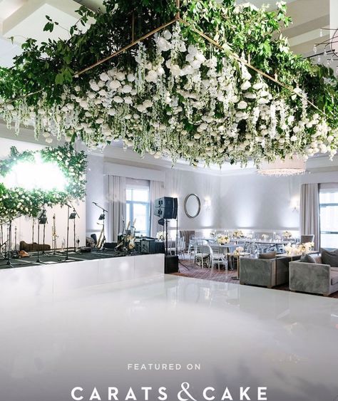 Large flower installation hanging over dance floor.  White dance floor with band backdrop with neon sign.  The Briar Club, Houston, TX. Event Design & Floral:  MAXIT Flower Design. Photography:  Josh & Dana Fernandez, Event Planner: Emily Moise,  Keely Thorne Events Backdrop With Neon Sign, Hanging Flowers Wedding, Hanging Wedding Decorations, Flower Ceiling, Wedding Ceiling, Dance Floor Wedding, Flower Installation, Ceiling Treatments, Wedding Set Up