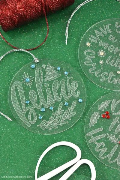 Engraved Acrylic Ornament Cricut, Christmas Ornaments With Cricut, Christmas Ornaments With Names, Ornaments With Cricut, Diy Book Holder, Ornaments With Names, Metal Engraving Machine, Acrylic Christmas Ornaments, Cricut Ornaments