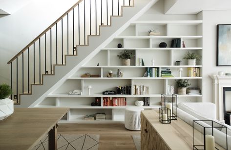 Basement flooring ideas: 10 ways to get a stylish and functional finish | Homes & Gardens | Under Stairs Shelving, Under Stairs Storage Closet, Shelves Under Stairs, Stairs Pantry, Stair Bookshelf, Under Stairs Nook, Under Stairs Storage Solutions, Stair Nook, Ruangan Studio