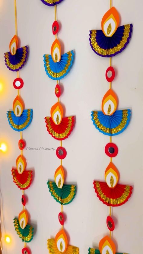 Colours Creativity Space | 🪔Diya wall Decor/ Holder From Paper / Diwali Decor DIY 19 Easy Diwali decoration from paper Diwali background decoration Diwali diya… | Instagram Paper Diya, Diwali For Kids, Diya Decoration Ideas, Diwali Background, Diwali Diya Decoration, Diy Canvas Art Easy, Door Hanging Decorations, Diwali Decorations At Home, Cardboard Crafts Diy