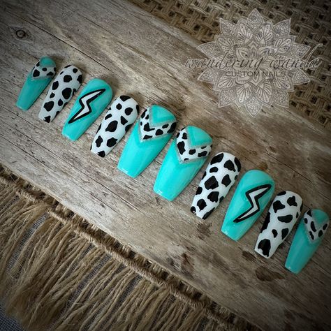 Ombre turquoise & silver cow print nails with a lightning bolt feature.  Gloss finish *Short & Long Coffin shape shown. Your new salon quality nail enhancements made by a professional nail artist, come with 10 custom nails in a box with protective packaging, detailed instructions for application & removal, cuticle pusher, wood file, buffer, alcohol wipe, nail tabs, glue & lotion spatulas. Made with Professional only products. Vegan, Cruelty & 10 free. Eco-friendly protective packaging for minima Simple Cow Print Nails, Cow Print Accent Nails, Diy Western Nails, Full Nail Designs, Western Christmas Nails Acrylic, Cowgirl Nails Designs Westerns, Cow Print Nail Art, Nail Inspo Western, Cowgirl Nail Ideas