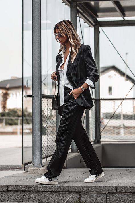 Obsessed with how these sneakers match to a suit... Click to find 11 Sneakers To Invest In Right Now For 2020 « Jennysgou  #women #suit #sneakers #veja # streetstyle #citystyle #stripedsuit Sneakers With Formal Wear, Sneakers Suits Women, Suits And Jordans Women, Pant Suit With Tennis Shoes, Suits And Tennis Shoes Women, Pant Suit And Sneakers Women, Black Suit With Sneakers Woman, Trouser With Sneakers Women, Tux And Sneakers