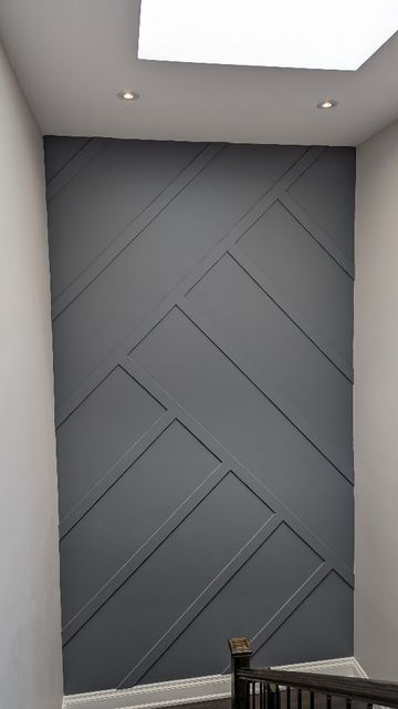 Black Accent Wall Stair Landing, Narrow Feature Wall, Stairs With Wall On One Side, Stairway Wall Design Ideas, Wood Accent Wall Staircase, Top Of Stairs Accent Wall, Accent Wall Hallway Stairs, Feature Wall On Stairs, Accent Wall Going Down Stairs