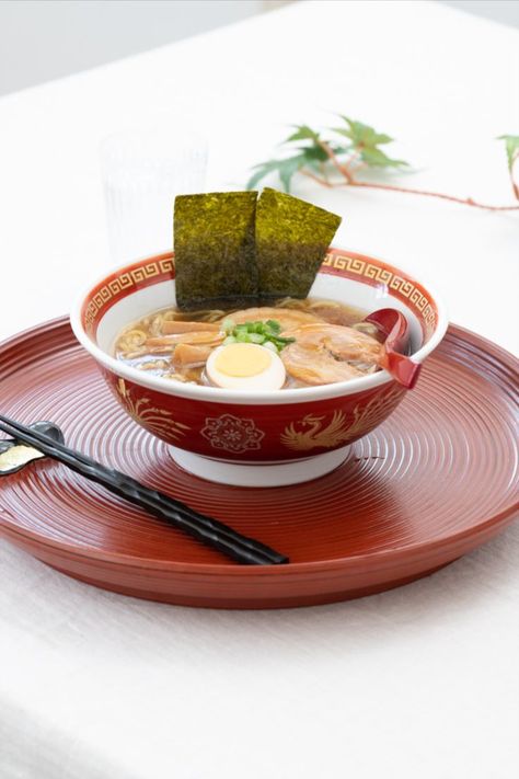 This is a regular sized ramen bowl of Mino ware. The red color painted with a brush and the golden dragon and pattern on the side are distinctive. #Japanesetableware #japanesedinnerware #Japanesefood #japanesemeal #japaneseceramics #japaneseporcelain #japanesebowl | Visit MUSUBI KILN to see other authentic Japanese tableware Japanese Dishes, Japanese Dinnerware, Ramen Bowls, How To Make Ramen, Chinese Pattern, Japanese Bowls, Japanese Tableware, Japanese Ramen, Ramen Recipes