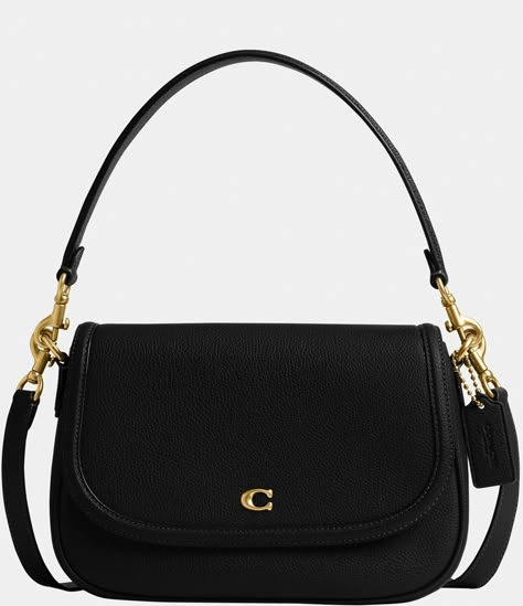 From COACH, the Legacy Small Pebbled Leather Shoulder Bag features: Featuring a COACH logo flap, this Legacy shoulder bag sits just beneath the underarm with the shorter strap or it can be worn as a crossbody. Small sized bag; 10"W x 7-.25"H x 2-.75"D (width is measured across the bottom of handbag); 1.32 lbs. approx. weightApprox. 7-.5" L removable short strap; 21-.5" L r Coach Bags Crossbody Black, Coach Shoulder Purse, Coach Top Handle Bag, Small Black Shoulder Bag, Cute Black Purse, Coach Purse Aesthetic, Coach Swinger Bag, Shoulder Purses, Crossbody Coach