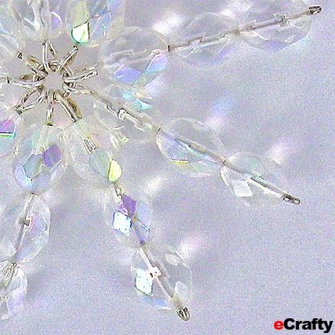 Look what Hannah dreamed up with our newest clear crystal beads, our eye pins, jump rings and a little 3D Crystal Lacquer! I especially love that this project is very portable – you can bead … Diy Beads Ideas, Snowflakes Tutorial, Snowflake Ornaments Diy, Snowflakes Diy, Diy Christmas Snowflakes, Crystal Jewelry Diy, Christmas Beading, Beaded Snowflakes Ornament, Beaded Christmas Decorations