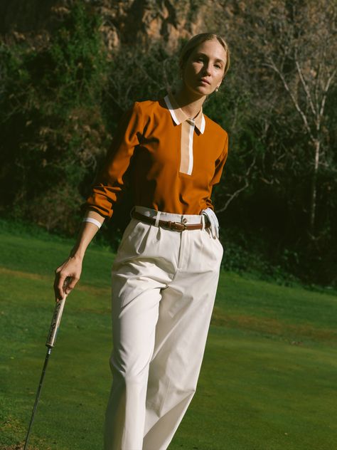 At last, a golf trouser that screams sophistication and wears perfectly. The wide leg pant features tonal tuxedo stripes and a 3" hidden hem. The 4-way stretch fabric is comfortable, wrinkle resistant and repels both water and stains. To top it off, we added sublte details like the hidden belt loop tee holders and complete stretch waist band that doesn't have that elastic appearance.A Note From Ali: This pant. It's been one I've dreamt of designing from the beginning. Bringing back a golf trouse Summer Golf, Womens Golf Fashion, Golf Wear, Golf Apparel, Golf Outfits Women, Knit Blazer, Golf Fashion, Wide Leg Pant, 4 Way Stretch Fabric