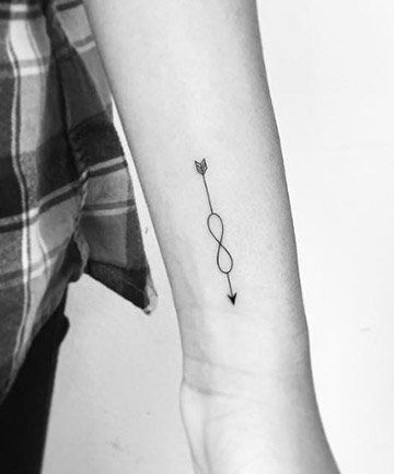 19 Best Arrow Tattoo Ideas to Inspire Your Next Ink Anchor Arrow Tattoo, Wrist Arrow Tattoos For Women, Infinity Arrow Tattoos For Women, 4 Better 4 Worse 4 Life Tattoo, Small Arrow Tattoos For Women, Arrow Finger Tattoo, Arrow Tattoo Ideas, Infinity Arrow Tattoo, Archery Tattoo