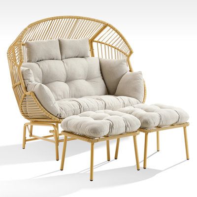 The Outdoor Double PE Wicker Glider Large Egg Chair with ottoman is a stylish and comfortable seating option designed for outdoor and indoor relaxation and leisure. The egg-shaped chair is built on a durable metal frame wrapped in all-weather resin wicker. Tufted seat and back cushion and a head pillow arrive with this chair and are upholstered in Olefin fabric added support as you sit. Plus, the swing egg chair with stand allows you glide back and forth smoothly, add joys and relax for you. Mat Large Lounge Chair, Egg Shaped Chair, Rattan Egg Chair, Wicker Lounge Chair, Patio Glider, Rocker Chairs, Glider Chair, Indoor Chairs, Patio Lounge