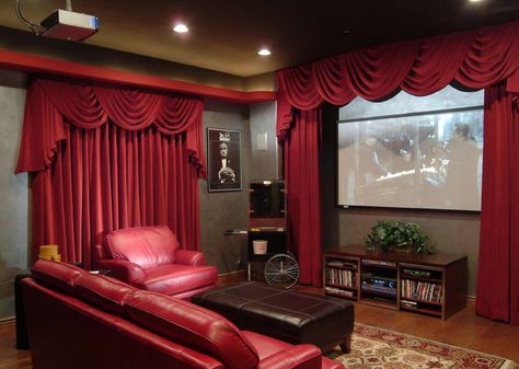 This Home Theater was enhanced with some traditional velvet drapes and swagged valances, creating a vintage look while blocking light from the window. Theater Curtains, Home Theater Curtains, Hollywood Theater, Movie Theater Rooms, Home Theater Room Design, Theater Rooms, Theatre Curtains, Theater Room Design, Home Cinema Room