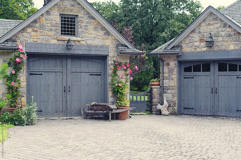 English Cottage Garage Doors With Gate Between Download this high-resolution stock photo by Leigh Love from Stocksy United. Cottage Garage Doors, Cottage Garage, Carriage House Garage, Best Exterior Paint, Home Styles Exterior, Garage Exterior, Carriage Doors, Garage Door Makeover, Garage Door Design