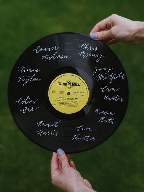 Handwritten records for wedding and event seating plans || Hello Heart String || #seatingplan #seatingchart #weddingcalligraphy #handwritten #vinyl #record #scottishwedding #weddingideas #weddinginspiration Vinyl Record Seating Chart, Record Seating Chart Wedding, Record Seating Chart, Hello Heart, Event Seating, Pastel Wedding Theme, Seating Plans, Wedding Table Plan, Jazz Club