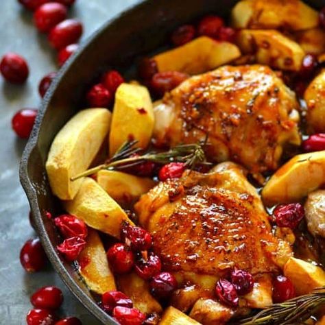 Juicy chicken thighs are roasted in tangy cranberries, soft apples, and covered in a sweet maple glaze for the EASIEST way to do chicken holiday-style! Soft Apples, Chicken With Apples, Maple Glazed Chicken, Juicy Chicken Thighs, Maple Chicken, Cranberry Chicken, Roasted Chicken Thighs, Cooking Healthy, Supper Ideas