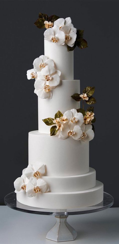 wedding cake, the most beautiful wedding cake, elegant wedding cake, wedding cake design, wedding cake inspiration, wedding cake photos, opulent wedding cake, wedding cake pictures, wedding cakes, wedding cake trends Wedding Cakes With Orchids, White Orchid Wedding Cake, Wedding Cake Trends For 2024, Fake Wedding Cake, Orchid Wedding Cake, White Orchids Wedding, Orchid Cake, Elegant Cake Design, Cake Elegant