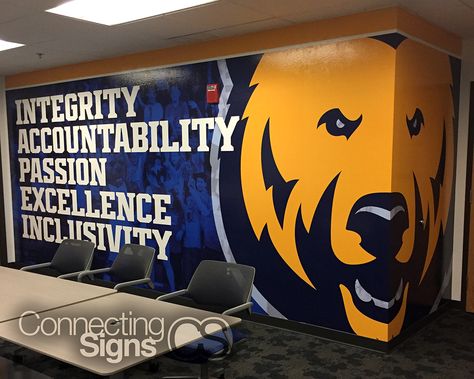 Show your school spirit with effective environmental graphics! This wall mural for the University of Northern Colorado does just that with a creative wrap-around effect designed within the graphics. Contact Connecting Signs today to get a fast quote on digitally-printed wall vinyl! School Signage, Window Mural, Floor Graphics, School Hallways, School Wall Art, School Murals, School Interior, Sports Design Inspiration, Window Graphics