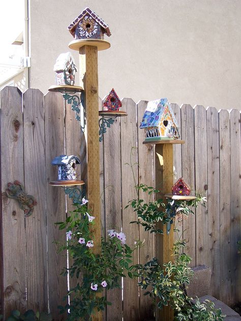 Each birdhouse is created in mosaics with broken China, handmade tiles and glass beads.   Animal Instincts Art Bird Feeder Stands, Garden Birdhouses, Deco Champetre, Bird Houses Diy, Broken China, Handmade Tiles, Bird Garden, Garden Crafts, Birdhouse