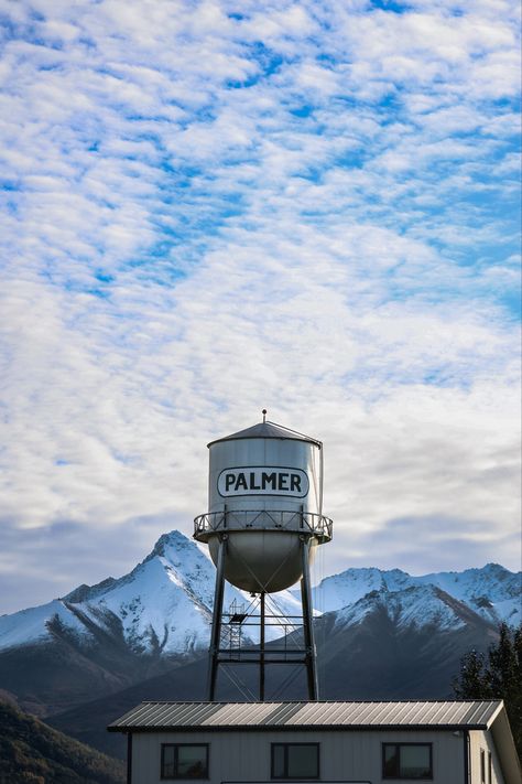 Water tower in Palmer Alaska with Snow Capped Mountains in background Palmer Alaska, Near Future, Water Tower, Alaska, Tower, Water, Travel, Quick Saves