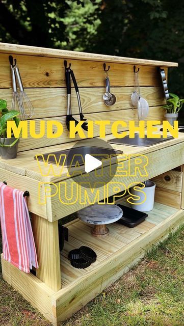 TRICIA • HOMAIN INTERIOR on Instagram: "How COOL is this?🚰😊adding WATER PUMPS to my DIY outdoor MUD KITCHEN was the best idea ever!! Find tutorials and product links to this adorable outdoor kids DIY in my mud kitchen highlights and follow along to see what I do next!   #mudkitchen #waterpump #kidsplay #diykids #montessoriathome" Kids Outdoor Mud Table, Outside Mud Kitchen For Kids, Mud Kitchen Water Dispenser, Easy Mud Kitchen Diy, Mudkitchen Outdoor Diy, Ikea Mud Kitchen, Kids Mud Kitchen Diy, Pallet Mud Kitchen Diy, Diy Mud Kitchen Outdoor Play