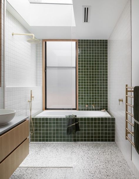 an airy mid century modern bathroom with a terrazzo floor, green and white tiles, a bathtub, a floating vanity and gold fixtures Mid Century Modern Bathroom Decor, Green Tile Bathroom, Mid Century Modern Bathroom, Mid Century Bathroom, Bad Inspiration, Hall Bathroom, Terrazzo Flooring, Modern Bathroom Decor, Bathroom Floor Tiles