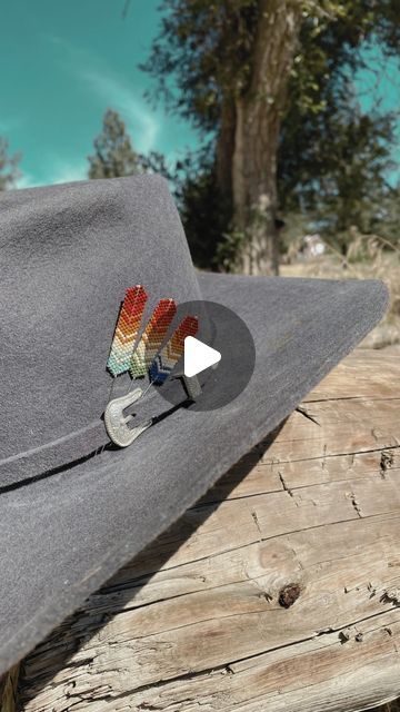 Custom Western Beadwork | Beaded Flatbrims on Instagram: "Every Hat deserves a Beaded Hat Feather

No hat is complete without a feather

Hand made to insure high quality work that will last a lifetime. Beaded from high quality glass beads and quality metal centers.

There is no reason to not have one for your hat

Check ‘em out in our best sellers section on the website 🤎" Beaded Hat Brim, Hat Pins Diy, Product Wishlist, Pins Diy, Beaded Hat, Feather Hat, Hat Pin, Quality Work, Hat Pins