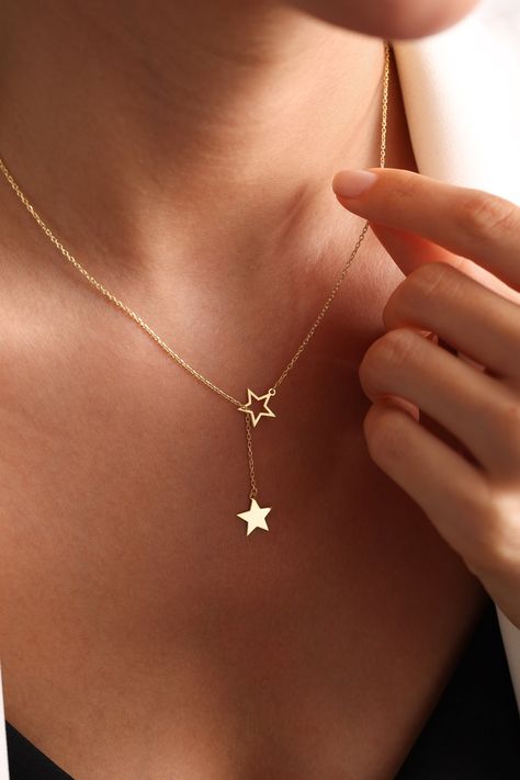 Star Charm Necklace, Tiny Star Necklace,  Super Star Necklace, Star Choker, Stars Necklace, Layering Necklace, Gift for her, christmas gift STAR NECKLACE Dainty gold star lariat necklace, perfect to wear by itself for a minimal look or layer it up with other necklaces. Our products are carefully prepared by our company from 925 Sterling silver. We offer you years of experience, product and service quality. FINISHED COLOR: Silver - Gold - Rose Gold Necklace length: 14 INCHES 15 INCHES 16 INCHES 17 INCHES 18 INCHES 19 INCHES 20 INCHES 21 INCHES 22 INCHES This necklace is the perfect gift for you loved ones. We wish you to use our products on happy days. Please visit my store for my other items. https://www.etsy.com/shop/onixjewellry Thank you so much for visiting and hope you enjoy shopping Minimal Gold Necklace, Gold Star Jewelry, Star Gold Necklace, Tiny Star Necklace, Jewelry Necklace Simple, Gold Star Necklace, Star Choker, Stars Necklace, Jewelry Star