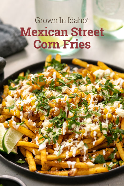 Looking for a delicious, approachable meal for your next get together? Look no further than these spicy Mexican Street Corn Fries. Grown In Idaho® Shoestring Fries are loaded with corn, onion, Cotija cheese, sour cream, lime, and cilantro for a burst of flavor in every bite. Side For Street Tacos, Mexican Street Corn Fries, Hot Day Meals, Street Corn Fries, Corn Fries, Street Fries, Bakes Recipe, Shoestring Fries, Loaded Fries