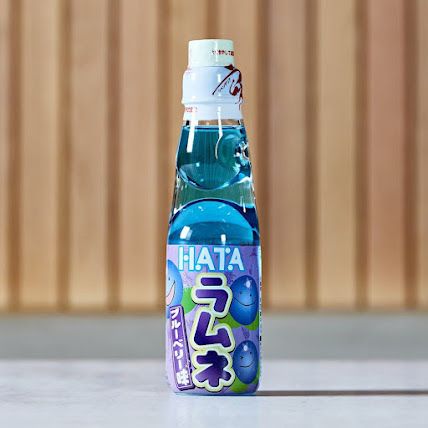 Tha Munchies: Blueberry Ramune Japanese Soda Ramune Soda Aesthetic, Ramune Aesthetic, Japanese Beverages, Japanese Candy Kits, Silly Creature, Japanese Soda, Strawberry Clothing, Japan Sweets, Japanese Drinks