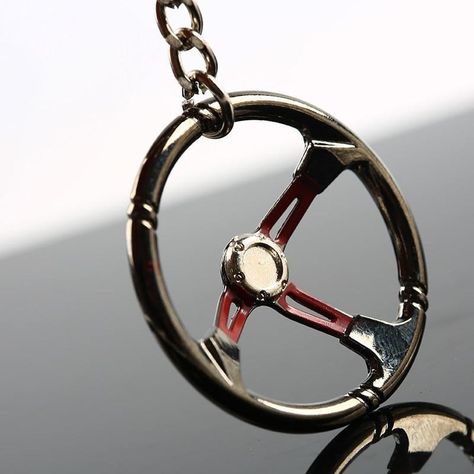 Steering wheel car keychain in chrome finish. Keychain Gear, Turbo Keychain, Motorcycle Keychain, Car Jewelry, Jdm Accessories, Cool Keychains, Mini Keychain, Car Key Ring, Car Steering Wheel