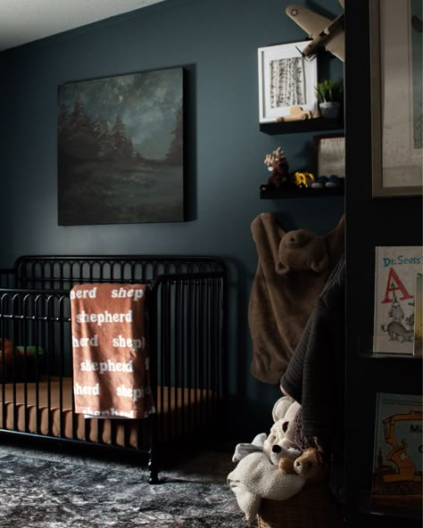 Dark Colored Nursery, Dark Academia Nursery Ideas, Masculine Nursery Baby Boy, Moody Blue Nursery, Black Brown Green Nursery, Black Baby Room Nurseries, Moody Baby Boy Nursery, Dark Vintage Nursery, Dark Wall Nursery