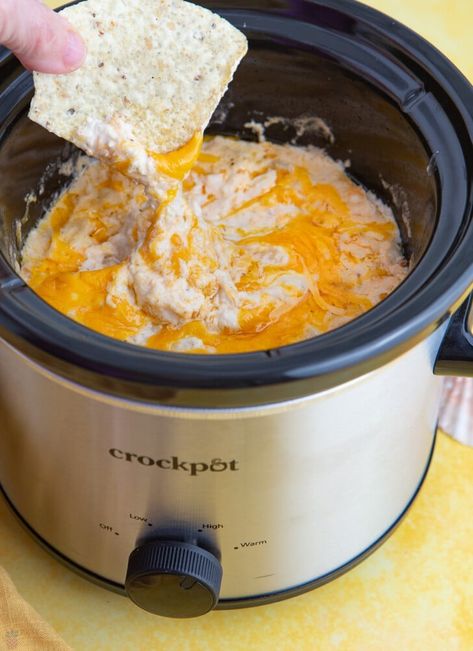 This easy crab dip recipe features a creamy, cheesy texture packed with classic crab seasonings. Whether hosting a fun gathering with friends or simply treating your loved ones to a special appetizer, this hot crab dip is guaranteed to be a showstopper. Hot Crab Dip Crockpot, Instant Pot Crab Dip, Crab Rangoon Dip Crockpot Easy, Maryland Crab Dip Crockpot, Crock Pot Crab Dip Recipe, Crock Pot Crab Rangoon Dip, Crab Ragoons Recipe Dip Crock Pot, Crab Dip Crockpot Easy, Lobster Crab Dip