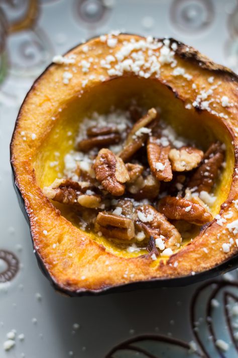 Rich, sweet roasted acorn squash doused in maple butter and filled with maple butter roasted pecans, then topped with blue cheese crumbles. TisTheSeasons AD Roasted Acorn Squash, Acorn Squash Recipes, Maple Butter, Roasted Vegetable Recipes, Roasted Pecans, Acorn Squash, Squash Recipes, Veggie Sides, Veggie Dishes