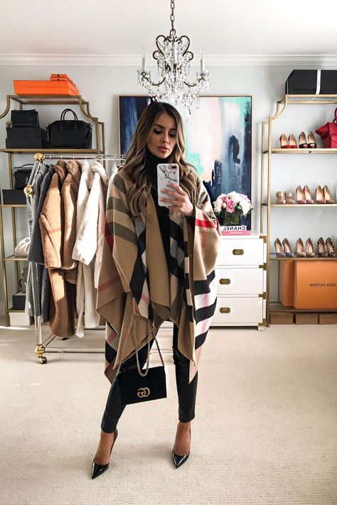 Fashion blogger mia mia mine wearing a burberry poncho for fall. Visit my blog to see more burberry outfits, luxury outfits for women, and poncho outfits for fall. #burberry #womensfashion #lookoftheday Burberry Poncho Outfit, Burberry Cape Outfits, Black Poncho Outfit, Burberry Outfits Women, Cape Outfits For Women, Burberry Scarf Outfit, Burberry Outfits, Burberry Poncho, Burberry Cape