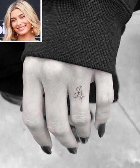 Hailey Baldwin Gets a New Tattoo on Her Ring Finger in Honor of Husband Justin Bieber Wedding Ring Finger Tattoos, Marriage Tattoos, Husband Tattoo, Wedding Band Tattoo, J Tattoo, Tato Henna, Wedding Ring Tattoo, Finger Tattoo For Women, Tattoo Wedding Rings