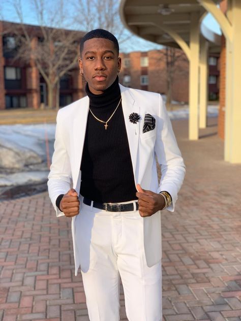 White suit, black turtleneck Prom Suits For Men Black Turtle Neck, White And Black Prom Suit, Matric Suits Men, Matric Ball Suits, White Turtleneck Outfit Men Formal, Turtleneck Suit Men Prom, Prom Suit Ideas For Black Men, Turtle Neck Outfit Men Suit Prom, Turtle Neck Outfit Men Suit