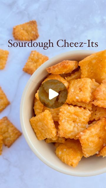 Emily Christensen | sourdough made easy on Instagram: "Like I said before I’m in my I could probably make that era. So might as well make homemade sourdough cheez-its. And you guys… these are way better than store-bought cheez-its.   They are crunchy, salty and cheesy. So easy to put together and bake in 15 minutes. I can’t wait for you guys to try these. They are truly next level 😍  Comment recipe and I’ll send you the link to these sourdough cheesy crackers!   #sourdoughdiscardrecipe #cheesecrackers #fromscratch #snacktime #sourdoughcracker" Sourdough Cheez Its, Sourdough Discard Cheezits, Emily Christensen, Cheez It Recipe, Using Sourdough Discard, Crackers Homemade, 2024 Lifestyle, Cheesy Crackers, Homemade Sourdough