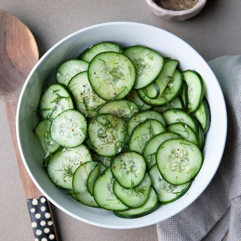 Sprinkling cucumber slices with salt and letting them stand in a colander draws out excess water so they stay crisp when set on a barbecue buffet. Try this cucumber dill salad alongside any grilled entree. —Taste of Home Test Kitchen Filled Cucumbers, Cucumber Dishes, Pansy Cards, Salads For Picnics, Simple Baked Beans Recipe, Deviled Egg Potato Salad, Dill Salad, Cucumber Dill Salad, Easy Baked Beans