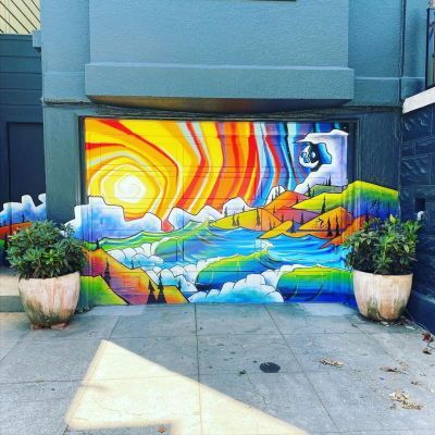 Not only the interior of the garage is thought, now you can decorate the outside of the garage with a colored door design. For example, you can apply colorful mural art to the garage door. This will also be a show of your work that can be seen by everyone. Colorful Mural Garage Door from @valerieanneturck12 #garagedecoration #garageupdateideas Garage Door Mural Ideas, Garage Door Murals Art, Garage Door Art, Artistic Garden, Garage Mural, Garage Door Mural, Colored Door, Garage Door Paint, Garage Update