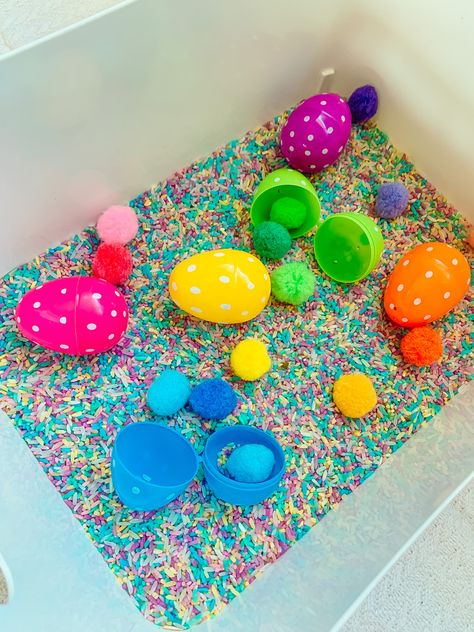 April Sensory Bin Preschool, Easter Toddler Sensory Bin, Easter Rice Sensory Bin, Easter Theme Sensory Bin, Easter Preschool Sensory Bin, Preschool Spring Sensory Bin, April Showers Sensory Bin, Easter Sensory Table Ideas, Plastic Egg Sensory Bin