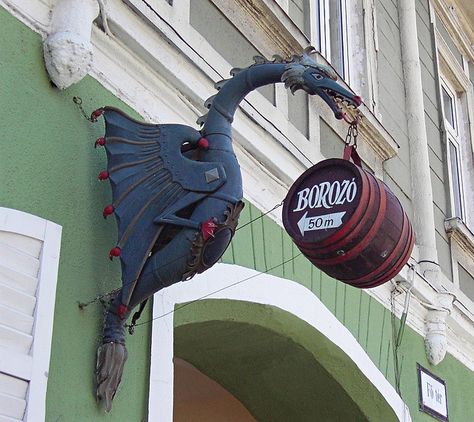 tavern sign, Veszprem, Hungary Medieval Pub, Pub Signage Design, Tavern Signs Ideas, Medieval Signboard, Fantasy Tavern Sign, Storefront Signs, Shop Signage, Dragon Wall, Trade Sign