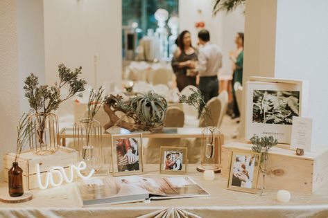 Displaying Engagement Photos At Wedding, Wedding Table With Photos Of Couple, Welcome Table With Pictures, Wedding Photo Reception Display, Guest Of Honor Table Decor, Wedding Photo Display Table, Wedding Welcome Table Decorations, Wedding Photo Table Ideas, Wedding Photo Table Decorations