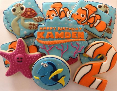 Finding Nemo cookies https://www.facebook.com/SugaredHeartsBakery Nemo Cookies, Nemo Baby Shower, Dory Birthday Party, Finding Nemo Party, Finding Dory Birthday, Nemo Birthday Party, Dory Birthday, Finding Nemo Birthday, Dory Party