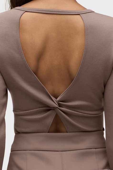 Description The Knot Back Bodysuit in Deep Taupe is a long sleeve crewneck in our new sculpting rib-scuba knit, a soft and flexible feel with every move. It has a bra-friendly back cutout with a comfortably-stretchy bodysuit styling. Product Details Body Length: 29", Chest: 31", Sleeve Length: 23.75"Model Height 5'9"Model wearing size SMeasurements based on size S Fit & Care Content: Women's Woven Bodysuit 49% Polyester, 45% Rayon, 6% SpandexMachine wash cold with like colorsDo not bleachTumble Bodysuit Styling, Scuba Knit, Woman Weaving, Kick Flares, Move It, Denim Branding, Men Fits, Hudson Jeans, Mens Outerwear