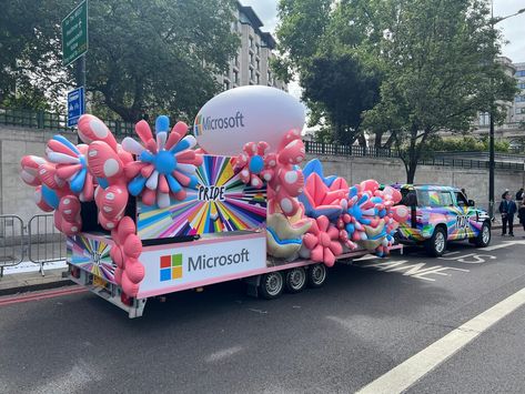 On Saturday 2nd July 2022, the 50th annual Pride parade took place in London, celebrating the joys and triumphs of the growing LGBT+ community as well as recognising the continuing fight against injustice and inequality. The team at Glow Inflatables were delighted to be involved with our client Seen Displays, setting up an outrageously stunning float for Microsoft, the multinational technology corporation. #pride #pridemonth Pride Float, Place In London, Transgender Flag, Parade Float, London Places, Pride Parade, July 2022, The Balloon, Flower Designs