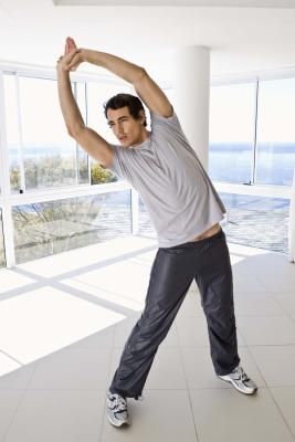 Basic Stretching Exercises For Men | LIVESTRONG.COM Stretching Exercises For Men, Person Stretching, Exercises For Men, Piriformis Syndrome, Trx Workouts, P90x, Muscles In Your Body, Getting Back In Shape, Mobility Exercises